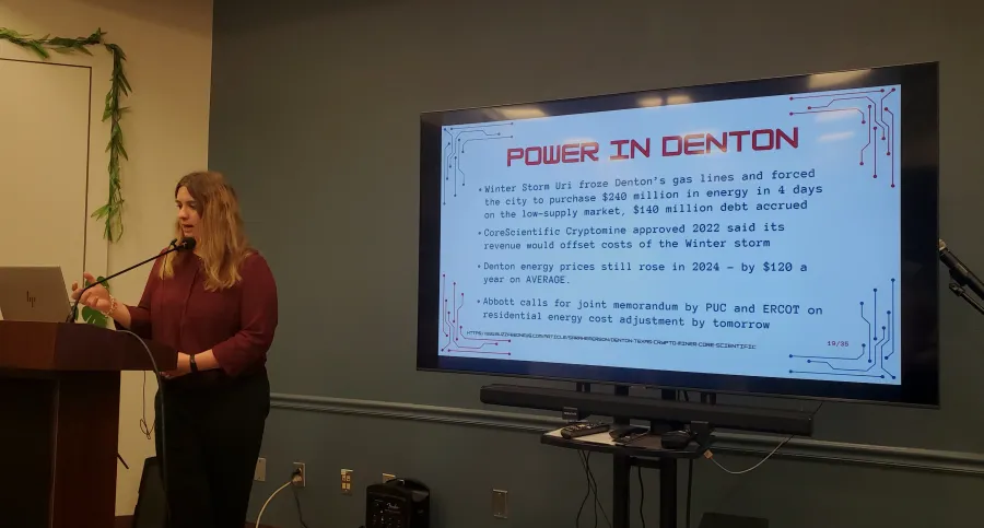 DSA member standing at the podium, sharing their research.